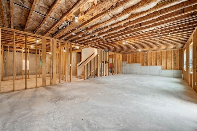 unfinished basement with stairway