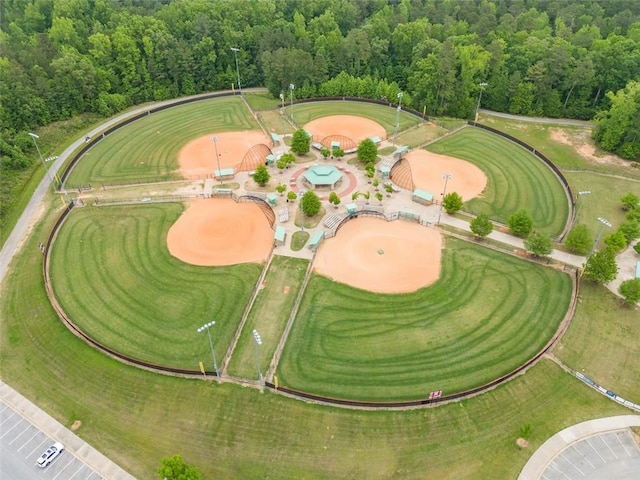 aerial view of property's location with a heavily wooded area