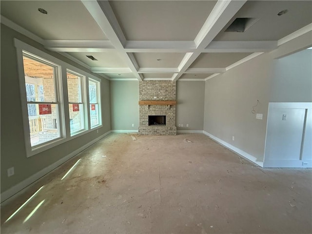 unfurnished living room featuring visible vents, beamed ceiling, baseboards, coffered ceiling, and a brick fireplace