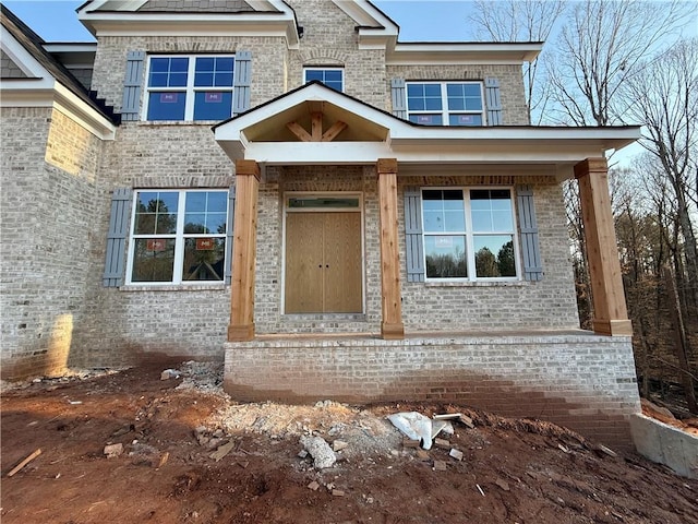 view of front of property with brick siding