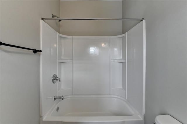 full bath with shower / tub combination and toilet