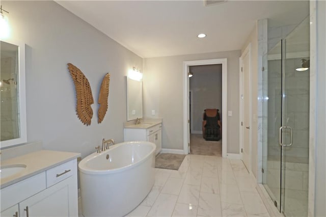 bathroom featuring double sink vanity, plus walk in shower, and tile floors