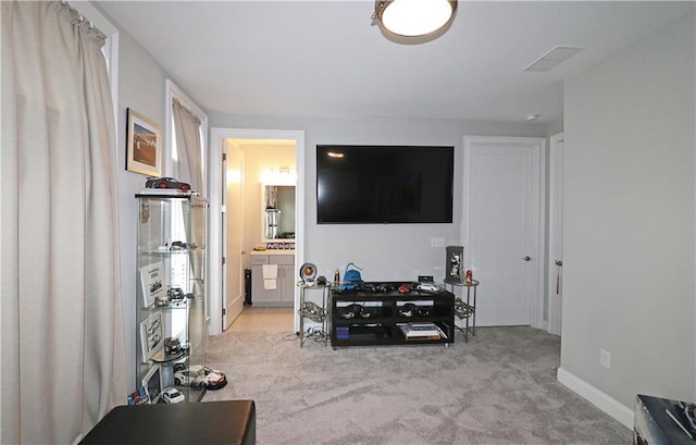 living room with light colored carpet