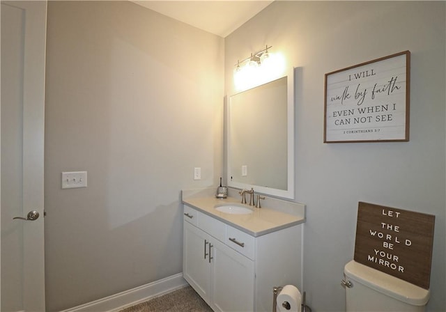 bathroom with oversized vanity and toilet