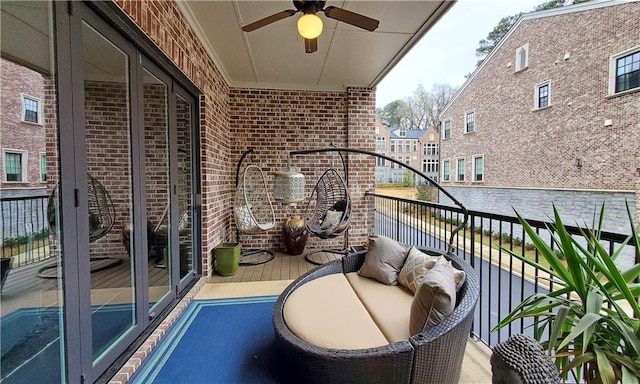 balcony featuring ceiling fan