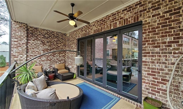 balcony featuring french doors and ceiling fan