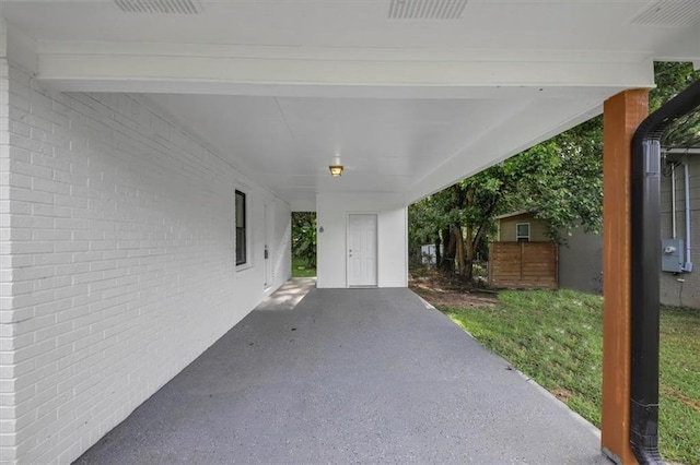 view of patio / terrace with a carport