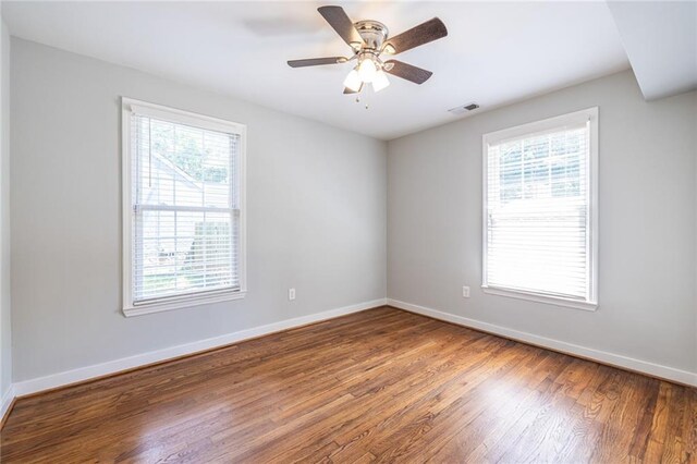 2010 2nd Ave, Decatur, GA 30032 - unfurnished room with healthy amount of natural light, wood finished floors, and ceiling fan