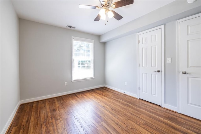 2010 2nd Ave, Decatur, GA 30032 - unfurnished bedroom with wood finished floors and ceiling fan