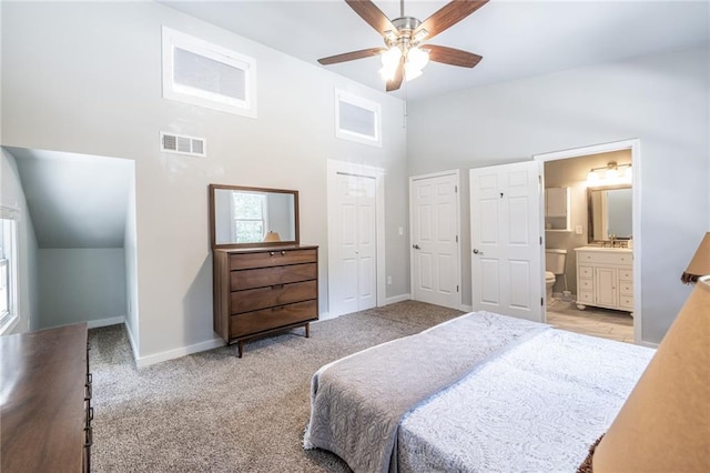 2010 2nd Ave, Decatur, GA 30032 - bedroom featuring a towering ceiling, a closet, ensuite bath, carpet flooring, and a ceiling fan