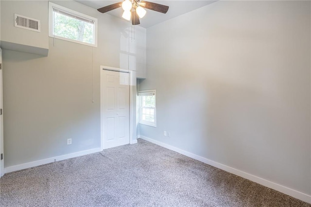2010 2nd Ave, Decatur, GA 30032 - spare room with a ceiling fan and carpet