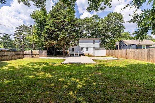 2010 2nd Ave, Decatur, GA 30032 - rear view of house with a patio area, a fenced backyard, and a storage shed