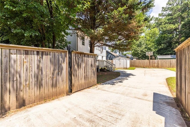 2010 2nd Ave, Decatur, GA 30032 - view of patio / terrace with a shed and concrete driveway