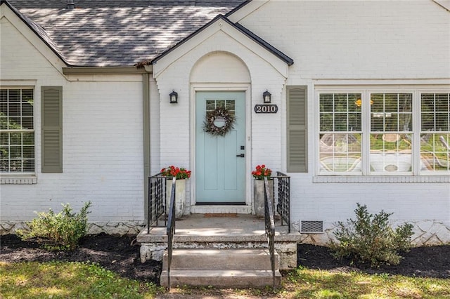2010 2nd Ave, Decatur, GA 30032 - view of exterior entry with brick siding and a shingled roof
