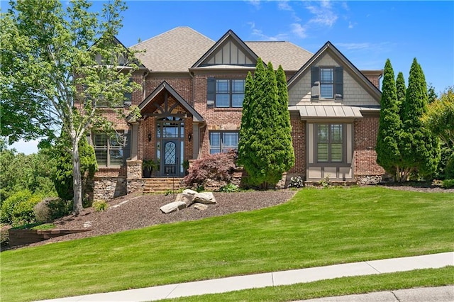 craftsman inspired home with a front yard