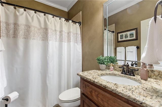 bathroom with toilet, crown molding, and vanity