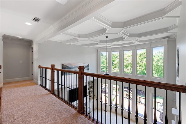 hall with ornamental molding, light colored carpet, coffered ceiling, and beamed ceiling