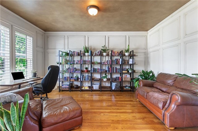 office with light hardwood / wood-style floors