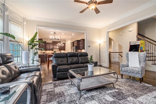 3015 Southmoor Trce, Roswell, GA 30075 - living room with dark wood-style floors, ceiling fan, a chandelier, crown molding, and stairway
