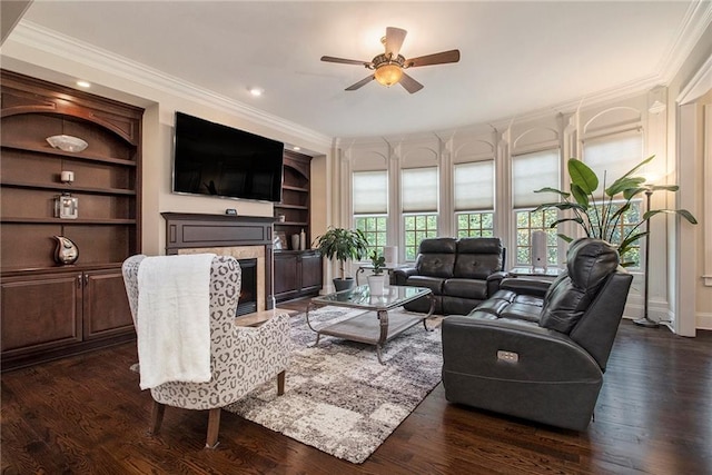 3015 Southmoor Trce, Roswell, GA 30075 - living area with crown molding, a fireplace, ceiling fan, built in shelves, and dark wood-style floors