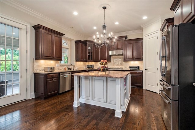 3015 Southmoor Trce, Roswell, GA 30075 - kitchen featuring appliances with stainless steel finishes, under cabinet range hood, a chandelier, dark brown cabinets, and dark wood-style floors
