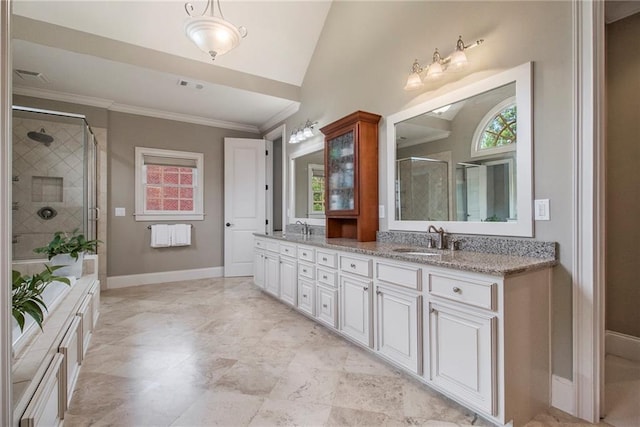 3015 Southmoor Trce, Roswell, GA 30075 - bathroom featuring double vanity, crown molding, a stall shower, and vaulted ceiling