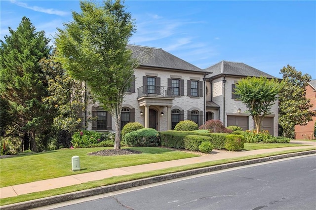3015 Southmoor Trce, Roswell, GA 30075 - view of front of home with a balcony, a front lawn, and a garage