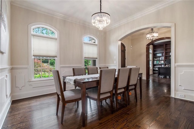 3015 Southmoor Trce, Roswell, GA 30075 - dining room with a chandelier, arched walkways, plenty of natural light, dark wood-style floors, and crown molding