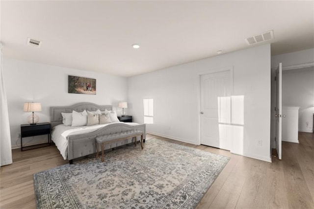 bedroom featuring light hardwood / wood-style floors