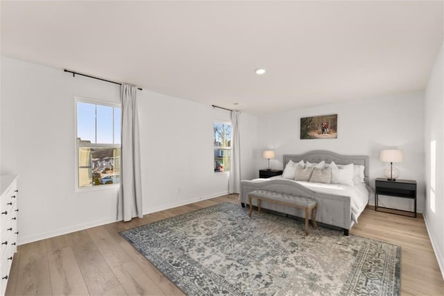 bedroom with light hardwood / wood-style floors