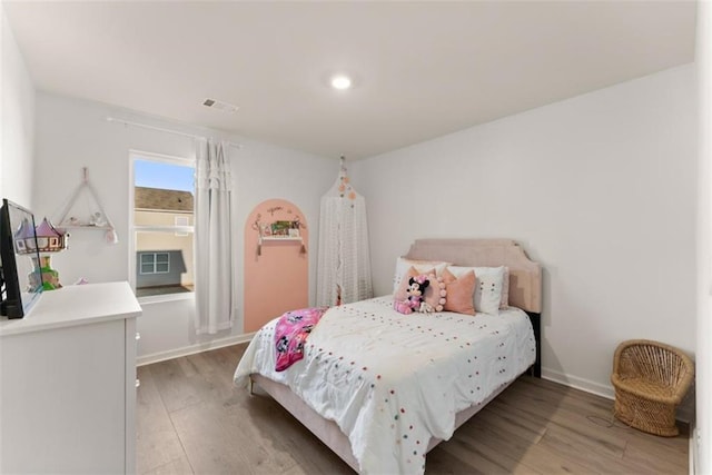 bedroom with light wood-type flooring