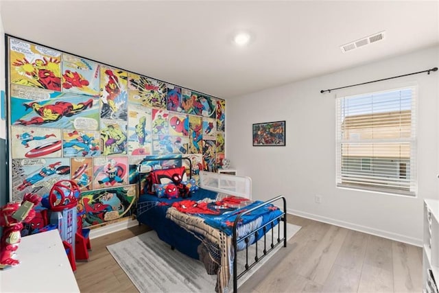 bedroom featuring light hardwood / wood-style flooring