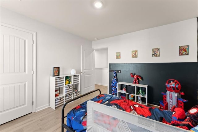 bedroom featuring light wood-type flooring