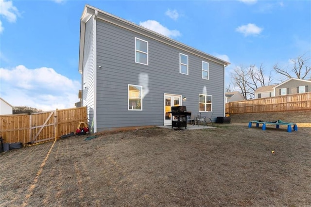 back of house featuring a patio