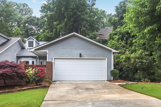 2983 Crosswycke Forest Dr, Brookhaven, GA 30319 - view of front facade with concrete driveway, a front yard, brick siding, and an attached garage