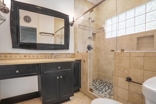 2983 Crosswycke Forest Dr, Brookhaven, GA 30319 - bathroom featuring a walk in shower, vanity, toilet, and tile walls