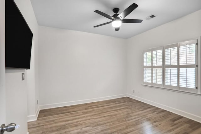 2983 Crosswycke Forest Dr, Brookhaven, GA 30319 - unfurnished room featuring wood finished floors, ceiling fan, and baseboards