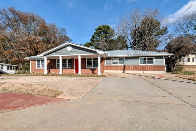 ranch-style house with a porch