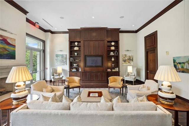 living room featuring crown molding