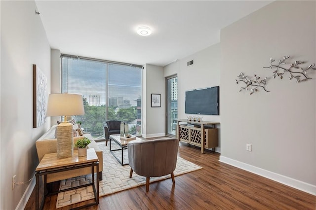 living room with hardwood / wood-style flooring