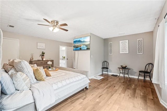 1752 Shadybrook Ct, Lawrenceville, GA 30043 - bedroom with baseboards, light wood finished floors, and a ceiling fan