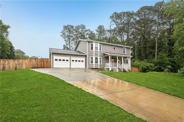 1752 Shadybrook Ct, Lawrenceville, GA 30043 - view of front of house featuring a porch, driveway, and an attached garage