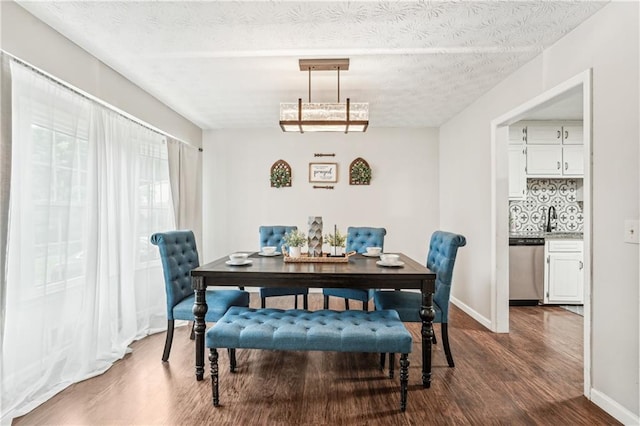 1752 Shadybrook Ct, Lawrenceville, GA 30043 - dining room featuring dark wood-type flooring and baseboards