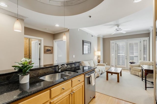 kitchen with dishwasher, hanging light fixtures, light hardwood / wood-style floors, and dark stone countertops