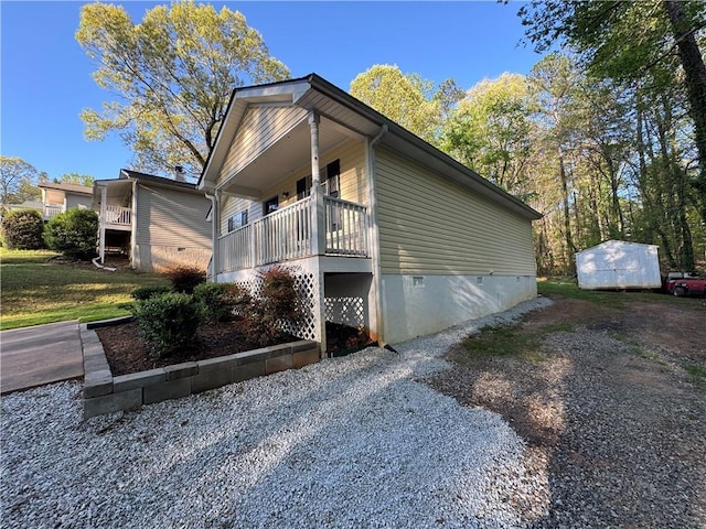 view of side of home with crawl space