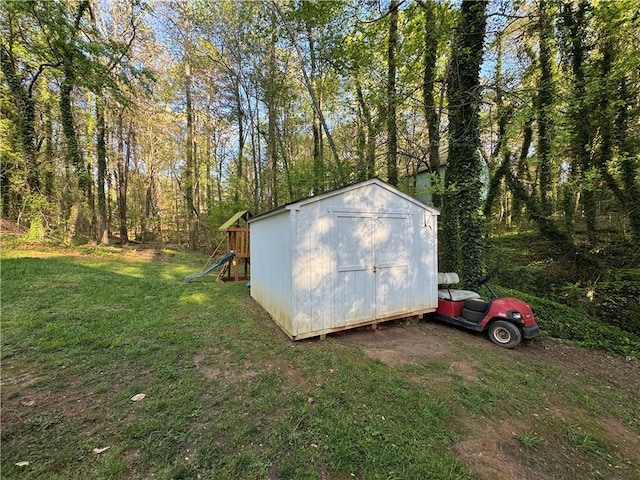 view of shed featuring a playground