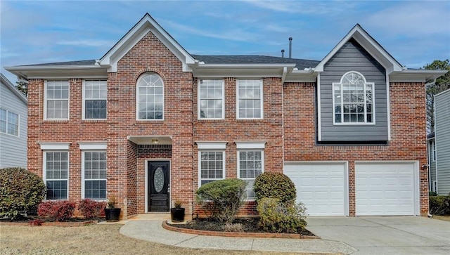 view of front of property featuring a garage