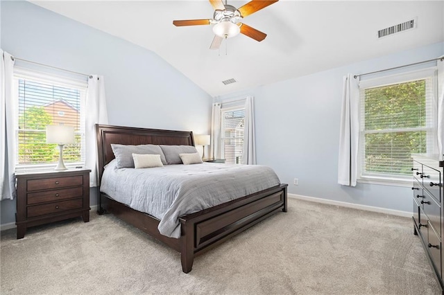 5710 Waters Edge Trl, Roswell, GA 30075 - bedroom featuring vaulted ceiling, multiple windows, light colored carpet, and a ceiling fan
