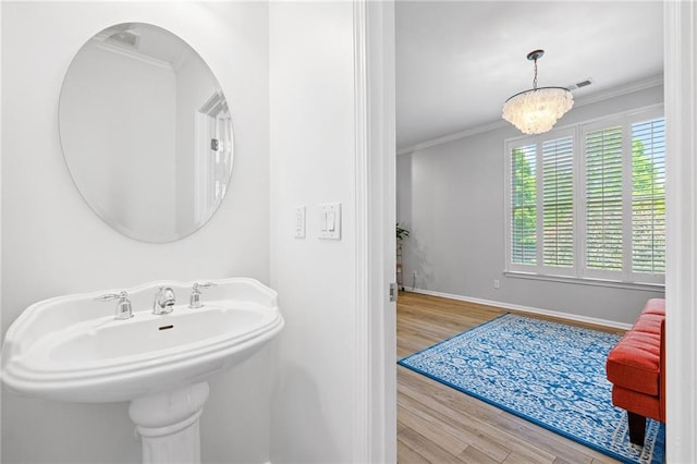 5710 Waters Edge Trl, Roswell, GA 30075 - bathroom with wood finished floors and ornamental molding