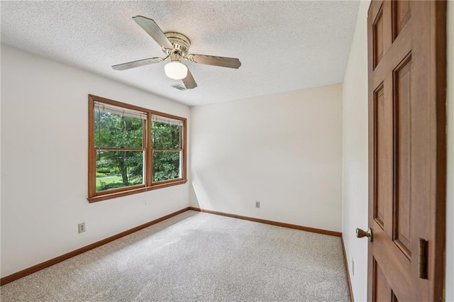 2110 Waterloo Cir, Lawrenceville, GA 30043 - carpeted empty room featuring a textured ceiling and a ceiling fan